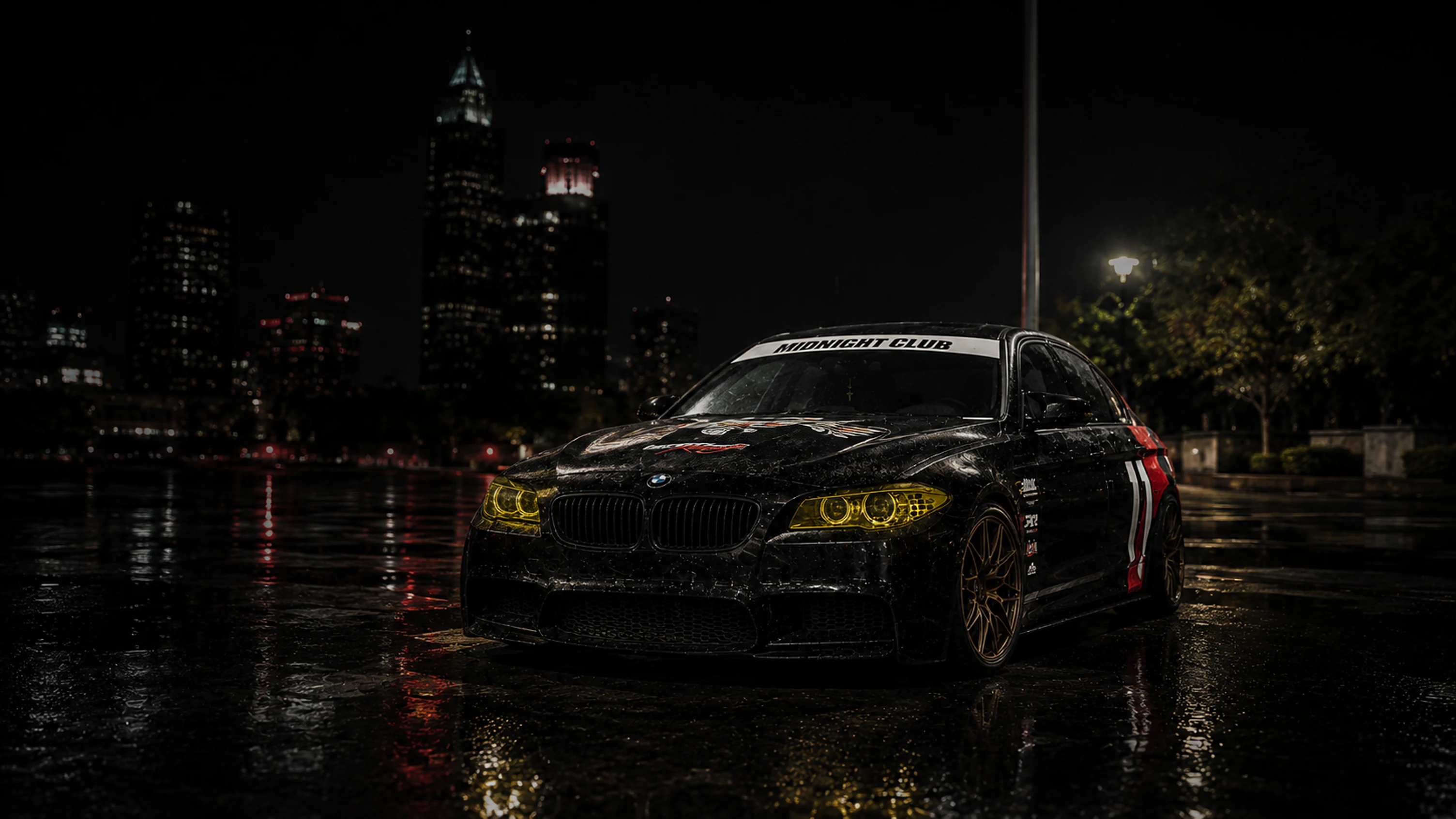 A blacked-out Creators Racing build on a rain-soaked city street at night